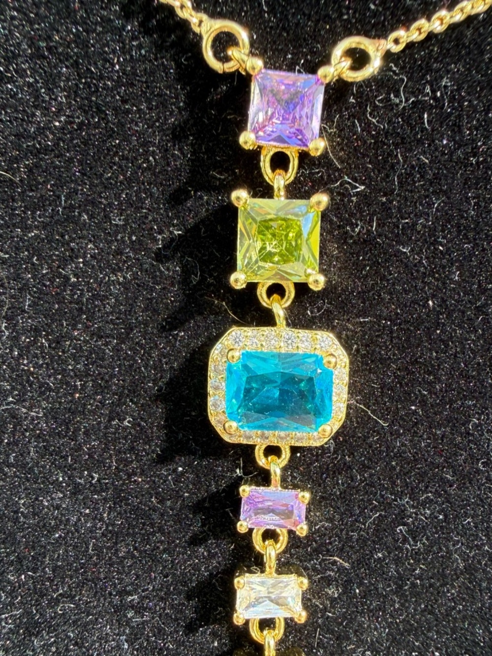 Multicolored gemstone necklace cascading down with sparkly colors - Picture 7 of 7